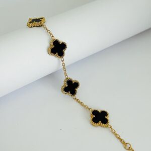 Bracelet doré trèfles noirs émaillés