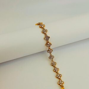 Bracelet doré fleurs scintillantes