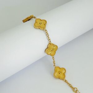 Bracelet doré fleurs gravées
